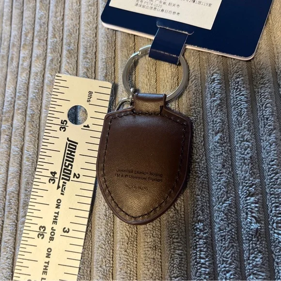 Universal Studios Beijing Logo Keychain Brown Leather New - Picture 4 of 6